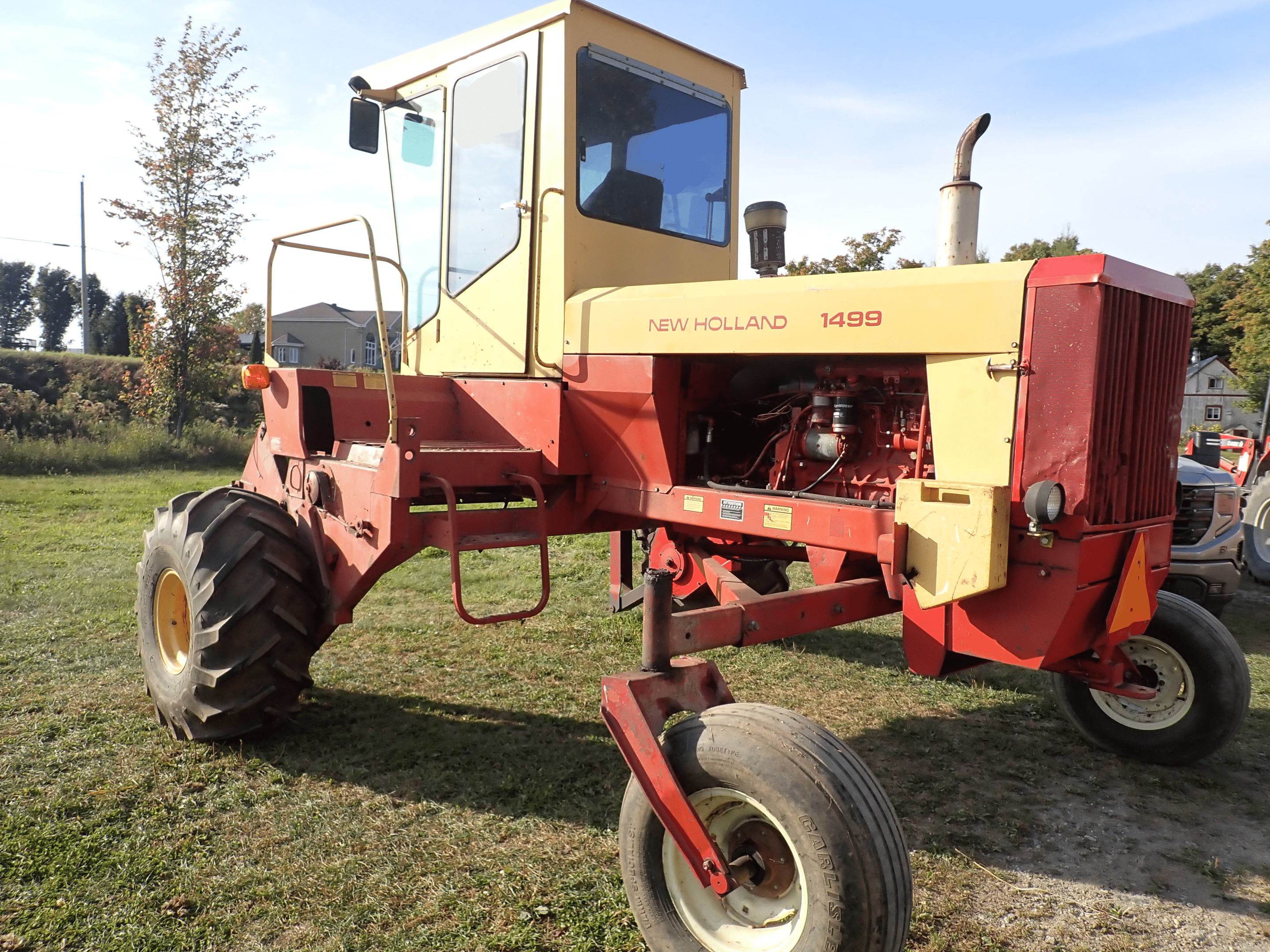 Andaineuse New Holland 1499T avec table de 18 pieds Macdon et buggy de transport pour andaineuse et wagon Horst pour table-Stock #S2362A/9636 – Image 3